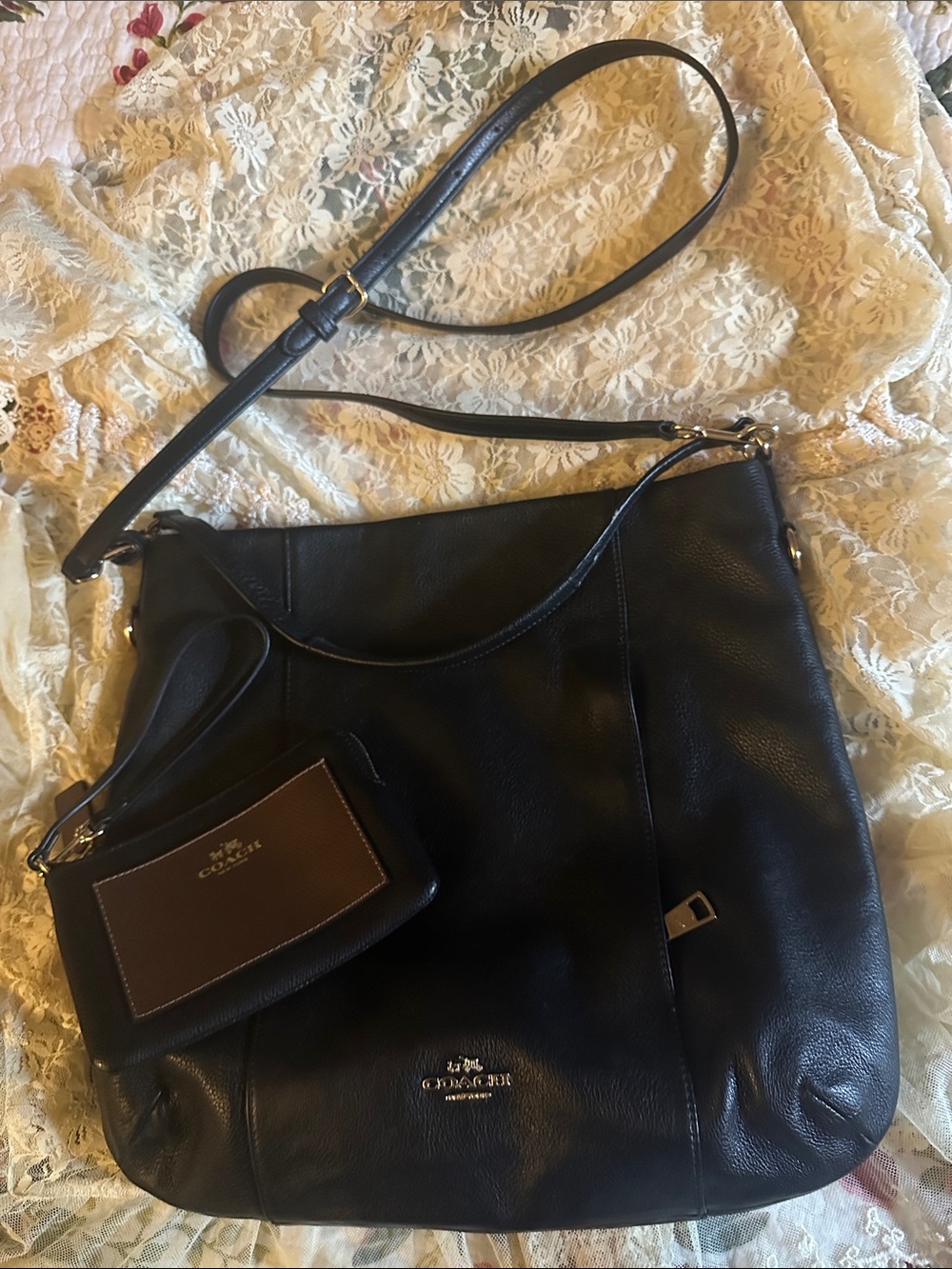 Coach Black Leather Shoulder Bag with coach Black gold trim wristlet.  NWOT